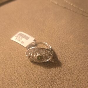 Elegant Silver Ring with Green Accent